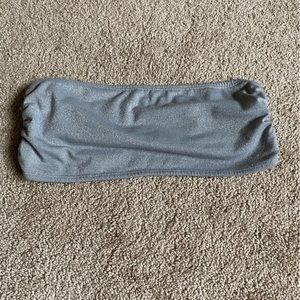 Material Girl, silver tube top. Size small. Preowned but never worn.